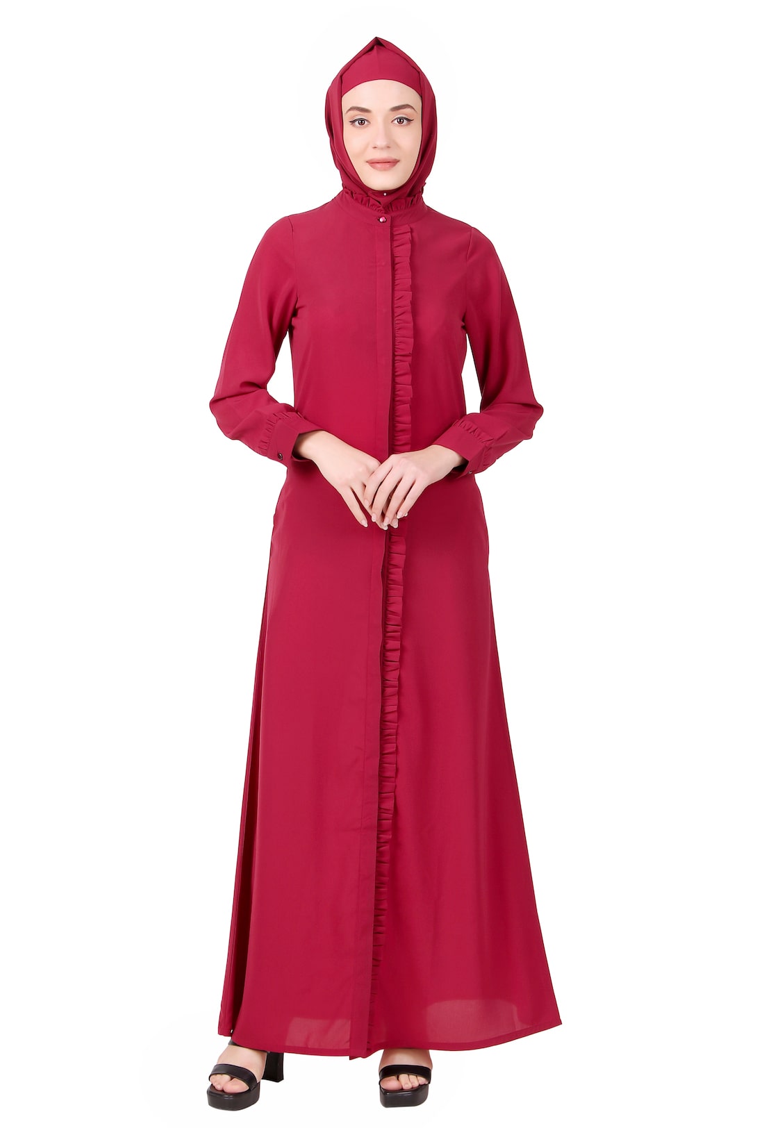 A woman wearing a full front open abaya with frills on placket in rose pink color, paired with a matching square hijab.
