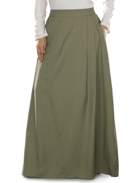 A green A-line skirt with pleats on one side and utility pockets on both sides, featuring an elastic waist on the back.