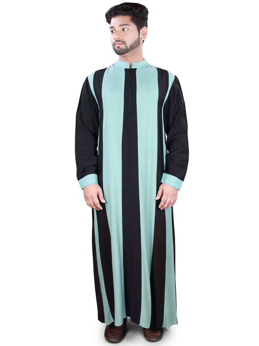 A man wearing a black and sky-blue striped Liban Galabiyya with a band collar and zip closure in front, standing against a white background.