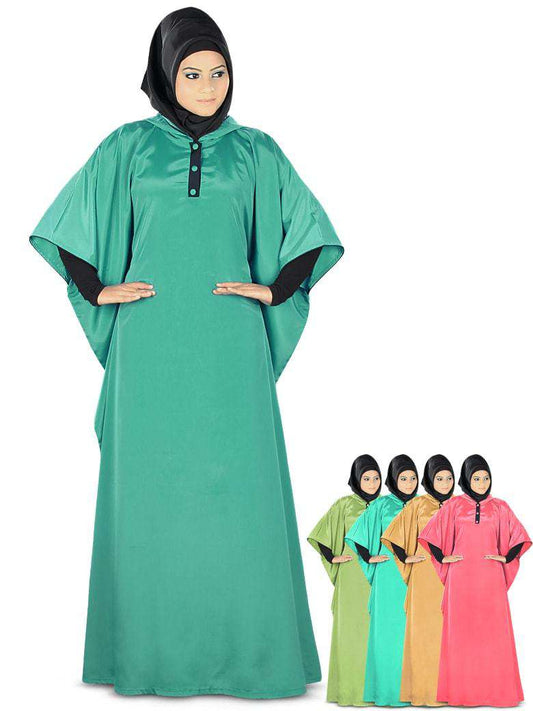 A model wearing a green hooded Kaftan with an attached neckline, front open placket with titch button closure, and black piping at the sleeve bottom. Also shown are two smaller versions of the Kaftan in different colors.